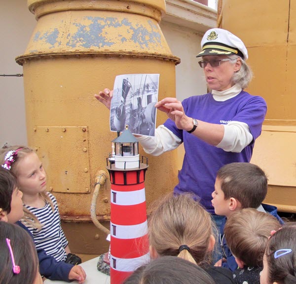 Museum director Mary Habstritt tells the children about the ship’s work as a U.S.C.G Lighthouse Tender from 1933 to 1972.